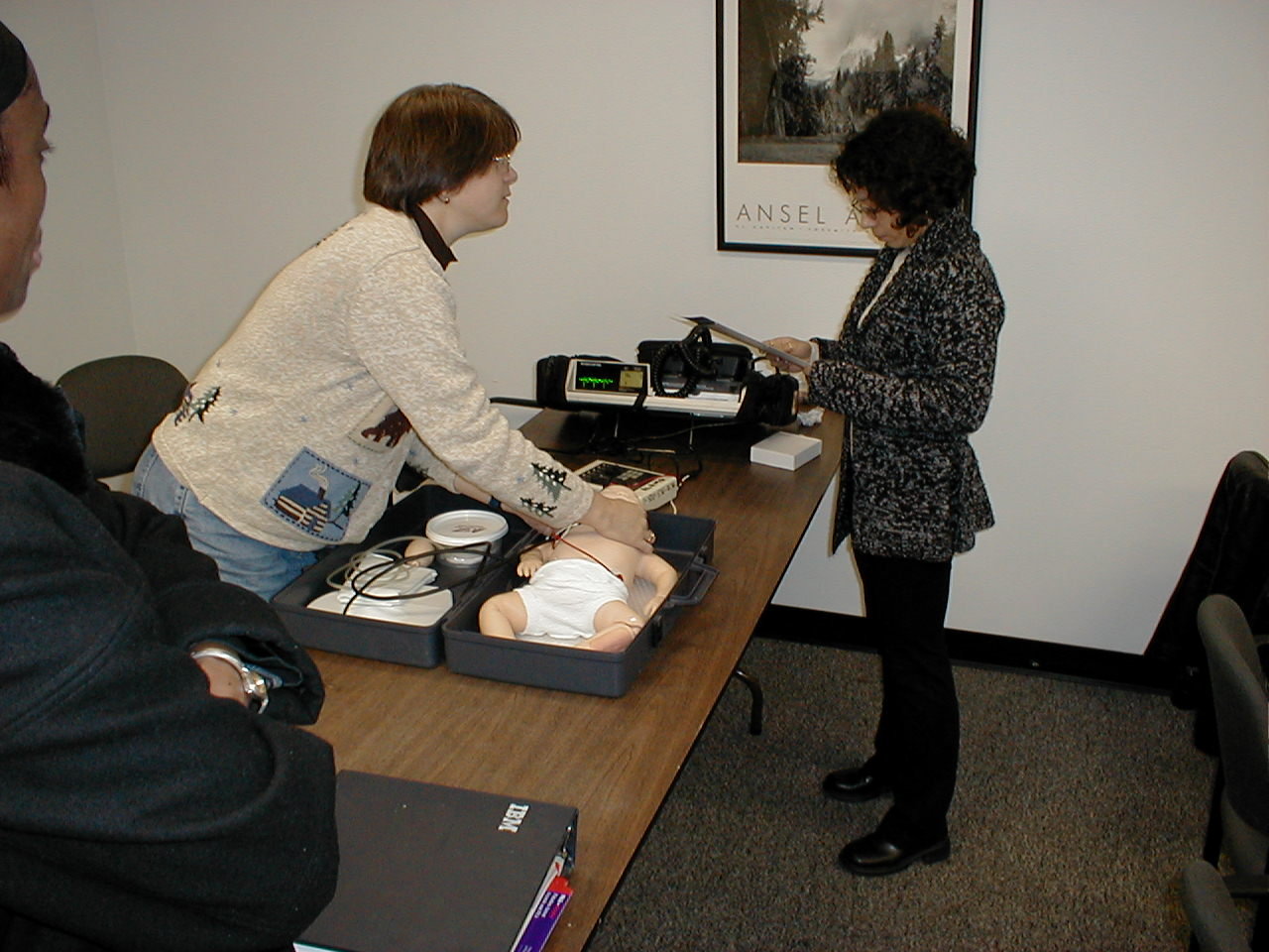 Pediatric advanced life support training with infant mannequin